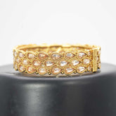 Tear Drop Antique Gold Plated Kundan Screw Bangle