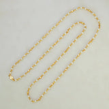 Gold Plated Pearl Mala Chain featuring shiny white pearls and delicate gold accent beads for a luminous look.