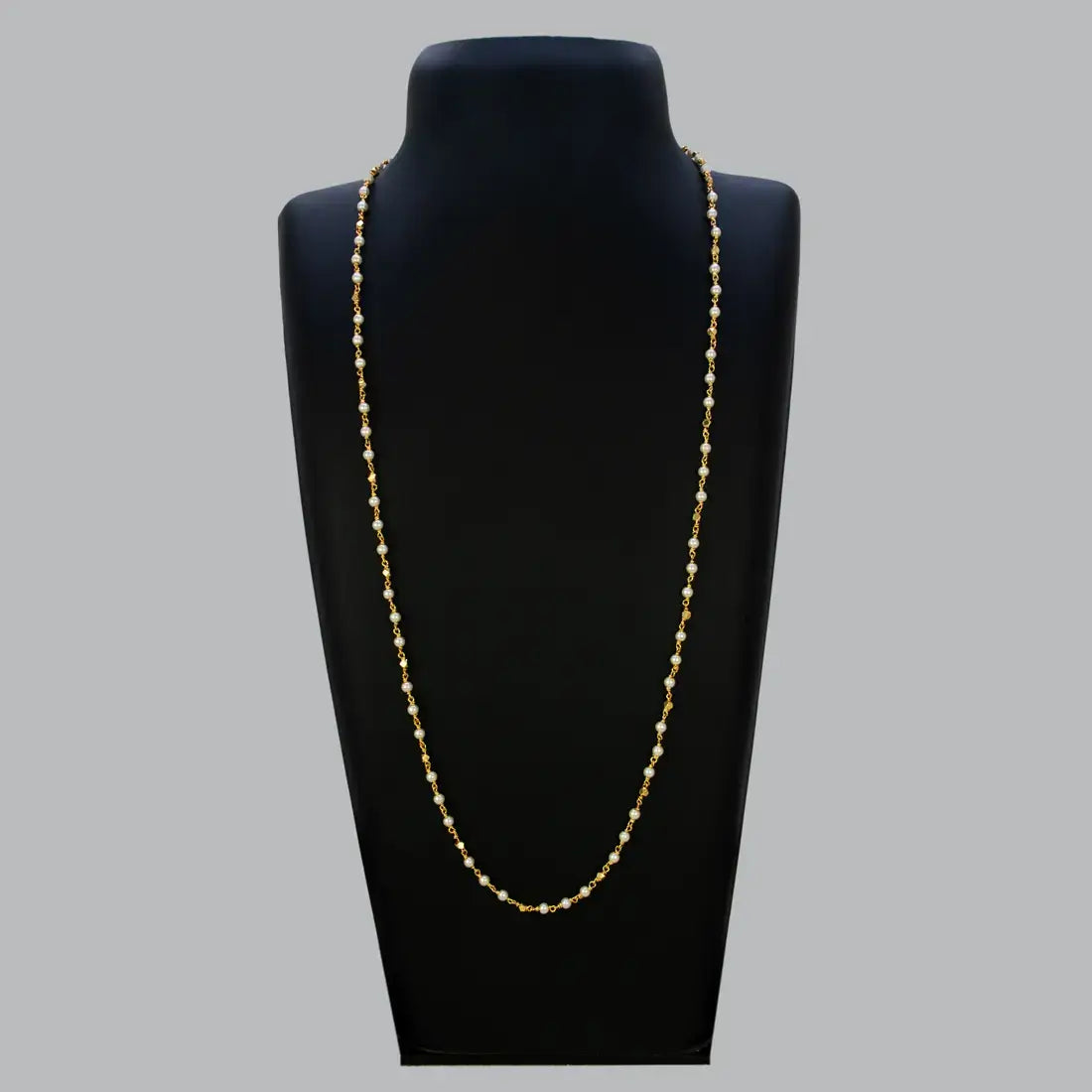 Gold Plated Pearl Mala Chain displayed on a jewelry bust, showcasing alternating pearl and gold accent beads.