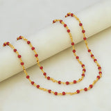 Gold Plated Coral Red Beads Chain featuring vibrant coral red beads on a fine gold-plated link chain.