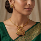 Antique 2-Strand Kemp Stone Pendant Necklace Set showcased on model, featuring intricate peacock design and kemp stones.