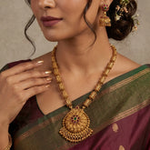 Antique Temple Floral Kemp Stone Long Chain Set worn by a model, showcasing the ornate necklace and jhumka earrings.