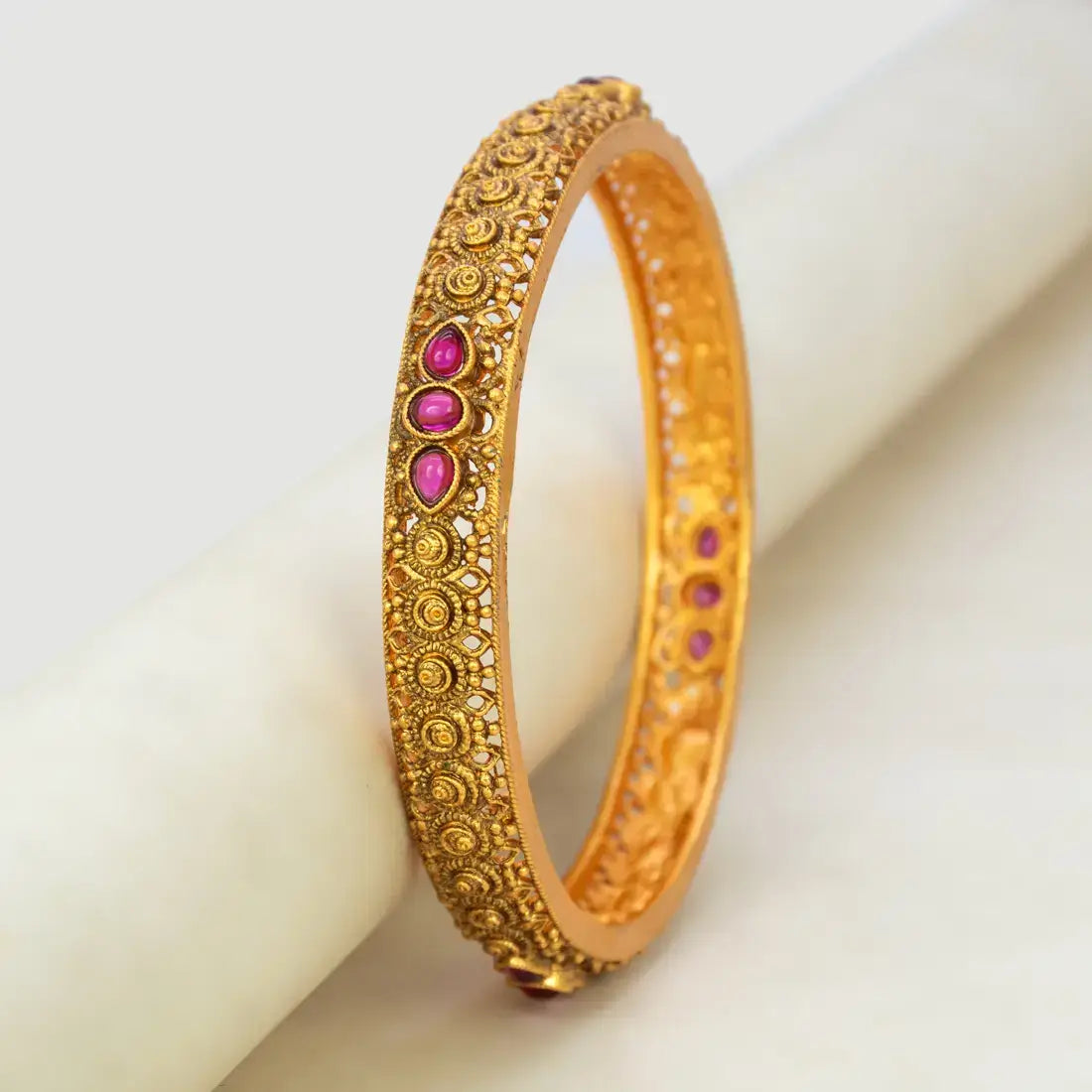 Antique Gold Plated Kemp Stone Kada Bangle with intricate design and ruby red stones.