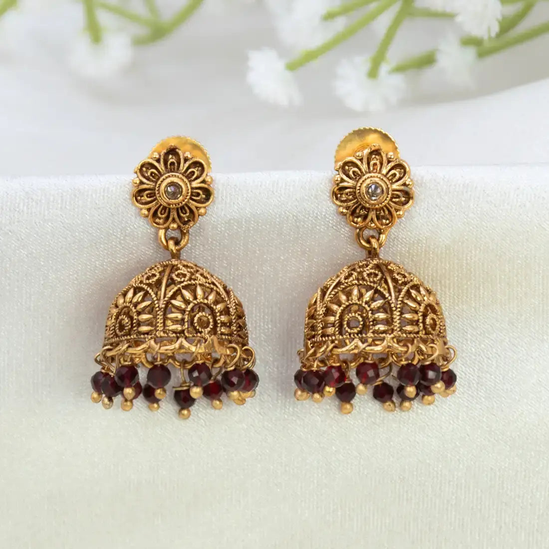 Antique Floral Crystal Hanging Jhumka Earrings with gold detailing and colorful bead hangings.
