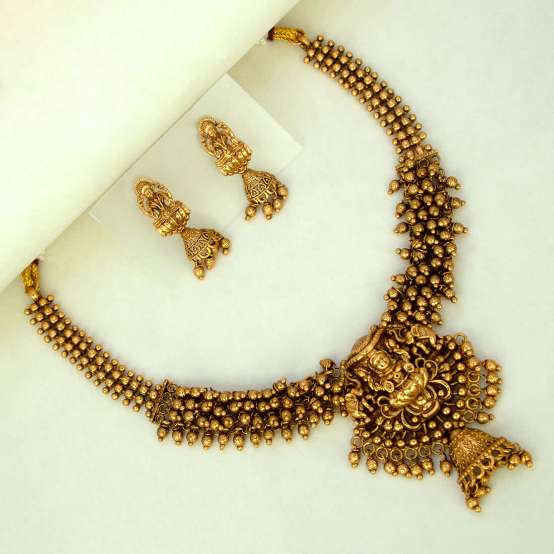 Antique Gold Plated Lakshmi Gunghroo Necklace Set- Gold