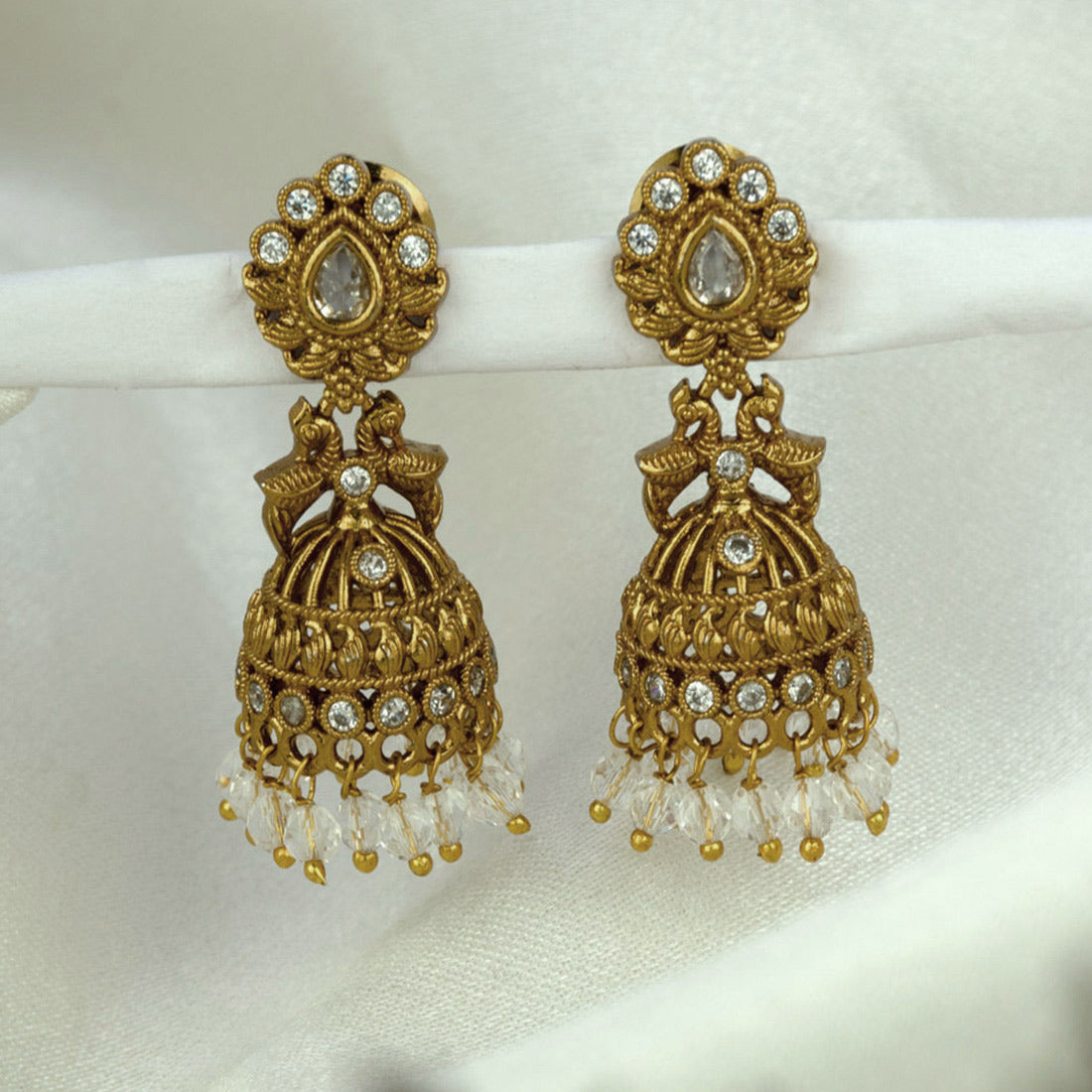 Small Antique Gold Plated Twin Peacock Stone Jhumkas with intricate design and dangling beads.