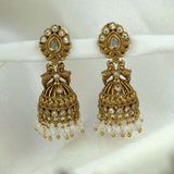 Small Antique Gold Plated Twin Peacock Stone Jhumkas with intricate design and dangling beads.
