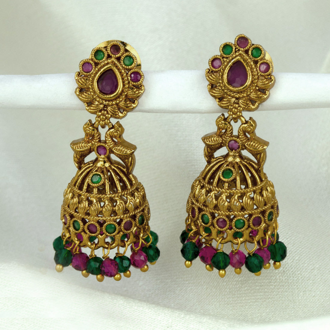 Small Antique Gold Plated Twin Peacock Stone Jhumkas with intricate design and colorful beads.