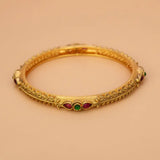 Antique Matte Kemp Multi Colour Stone Bangle showcasing intricate gold design with ruby red and emerald green stones.