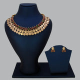 Antique Kemp Stone Lakshmi Kasu Choker Set displayed on a bust with matching earrings, showcasing vibrant kemp stones.