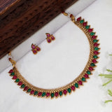 Antique Kemp Stone Mango Necklace Set showcasing antique gold finish with kemp stones and matching earrings.