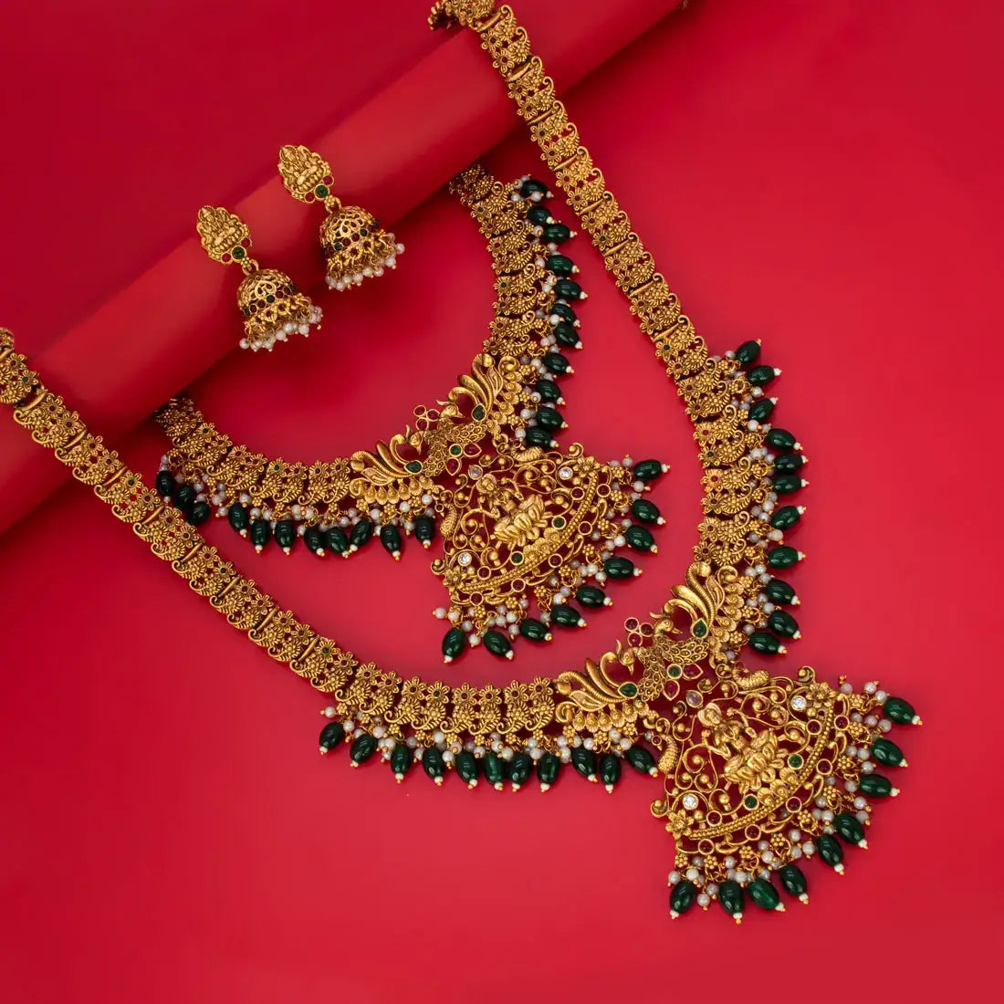 Antique Green Beads Lakshmi Bridal Jewellery Set featuring intricate Goddess motifs and peacock detailing.