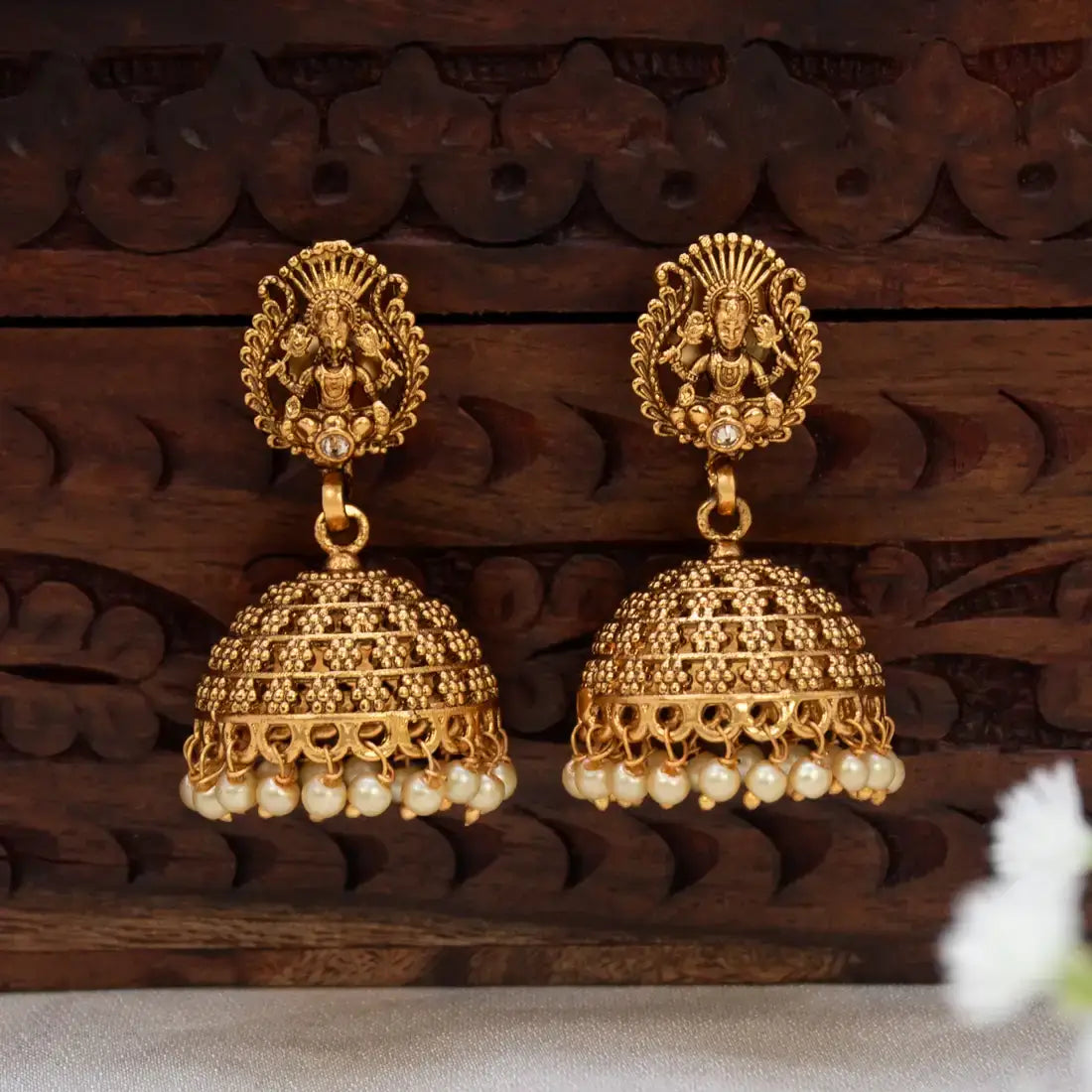 Antique Lakshmi Pearl Hanging Jhumka Earrings featuring goddess Lakshmi temple design with pearls.