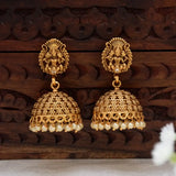 Antique Lakshmi Pearl Hanging Jhumka Earrings featuring goddess Lakshmi temple design with pearls.
