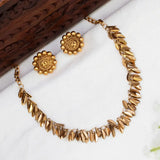 Antique Gold-Plated Leaves Necklace Set with matching stud earrings, showcasing layered leaf motifs and a classic design.