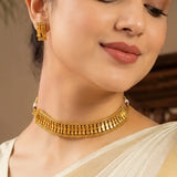 Woman wearing an Antique Single Line Elakkathali Necklace Set with traditional design, showing elegance and beauty.