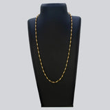 Gold Plated Black and White Pearl Chain Necklace for Women displayed on a black jewelry stand.