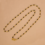 Gold Plated Black and White Pearl Chain Necklace for Women on a light background.
