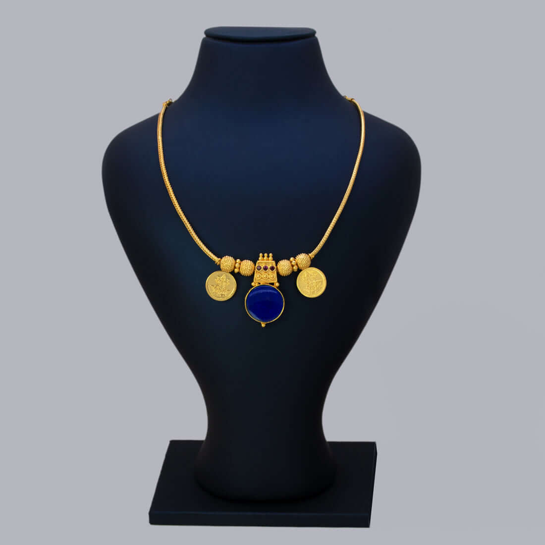 Green Enamel Gold Plated Lakshmi Kasu Necklace featuring gold-plated chain and decorative coins.