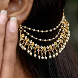 Floral Gold Plated Ruby Emerald CZ Pearl Ear Chain elegantly draping from the ear with pearls and vibrant stones.
