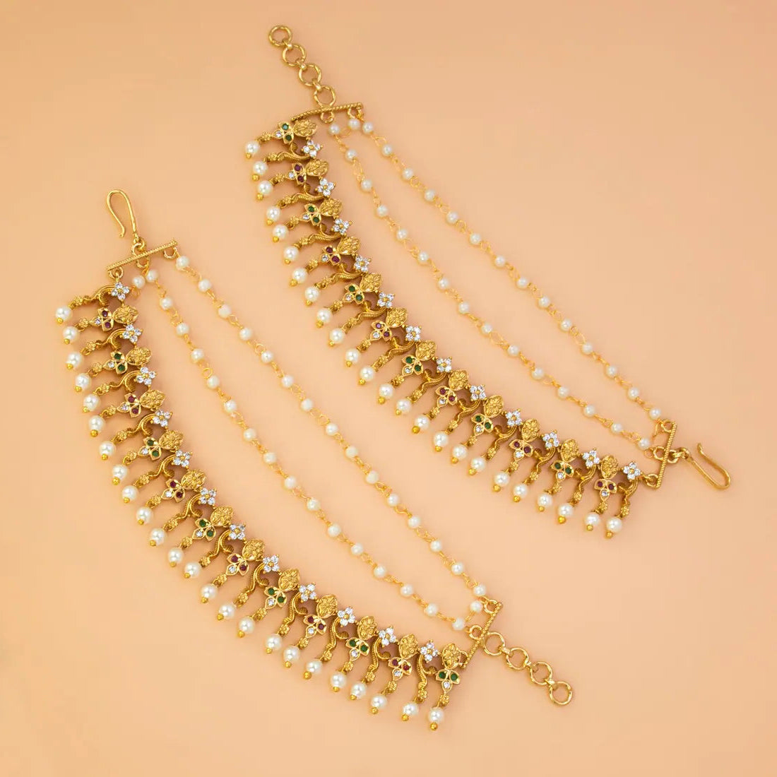 Floral Gold Plated Ruby Emerald CZ Pearl Ear Chain showcasing intricate gold motifs and cascading pearl layers.