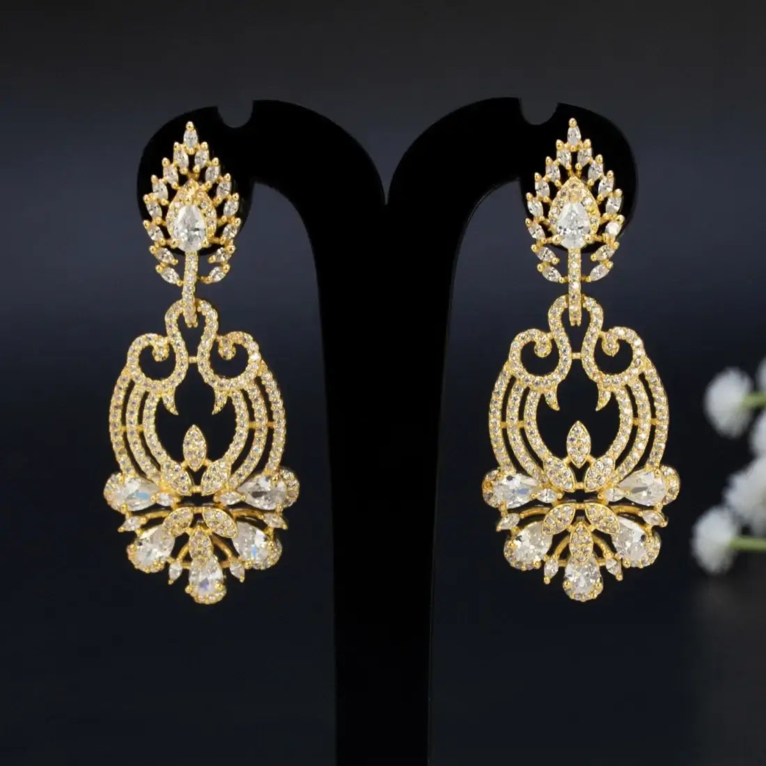 Elegant Gold-plated Cubic Zirconia Chandelier Drop Earrings showcasing intricate design and sparkling stones.