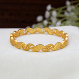 Gold-Plated Wave Serpent Bangle