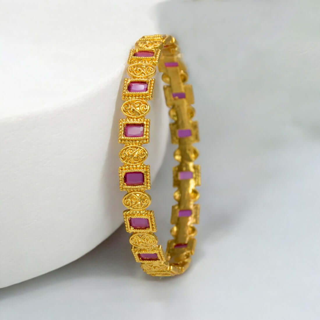 Elegant Rectangle Ruby Stone Bangle showcasing intricate design with semi-precious ruby stones.