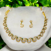 Antique Gold Plated CZ Emerald Floral Necklace Set showcasing elegant design with green and white stones.