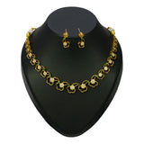 Antique Gold Plated CZ Emerald Floral Necklace Set displayed with matching earrings on a black bust.