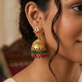 Multi-colour Beads Hanging Filigree Jhumka earrings worn by a woman, showcasing floral studs and colorful beads.