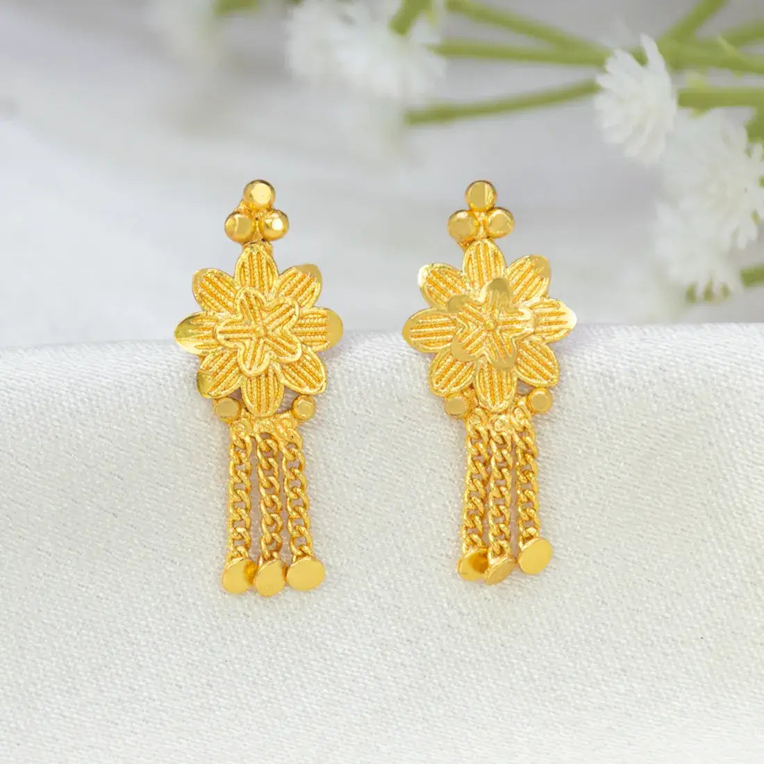 Gold Plated Floral Stud Chain Tassel Earrings featuring engraved floral design and chain tassels for an elegant look.