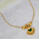 Gold-Plated Green Palakka Pendant Necklace featuring intricate gold-tone design and rich green palakka stone.