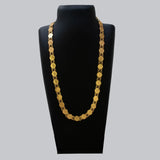 Ethnic Gold-Plated Head Kasu Long Necklace showcased on a black mannequin, featuring round kasu coins with head motifs.