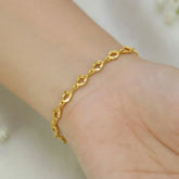 Lightweight Gold-Plated Designer Link Bracelet worn on a wrist, showcasing elegant link details and a refined style.