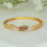Gold-Plated Kids Stone Open Bangle Bracelet with ruby and emerald stones and elegant design.