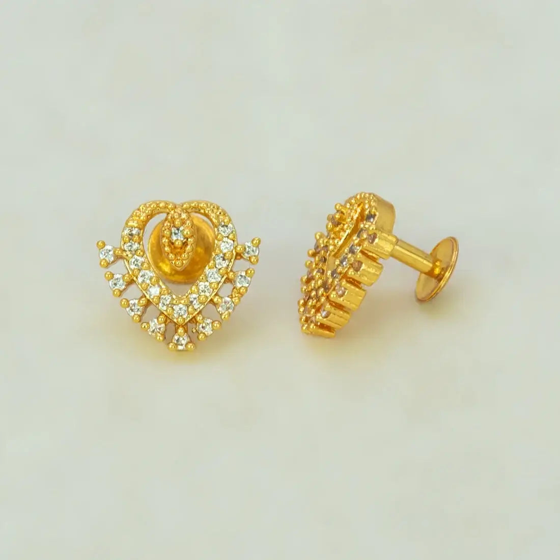 Dazzling Gold Plated Stone Heart Stud Earrings showcasing sparkling stones and layered heart design.