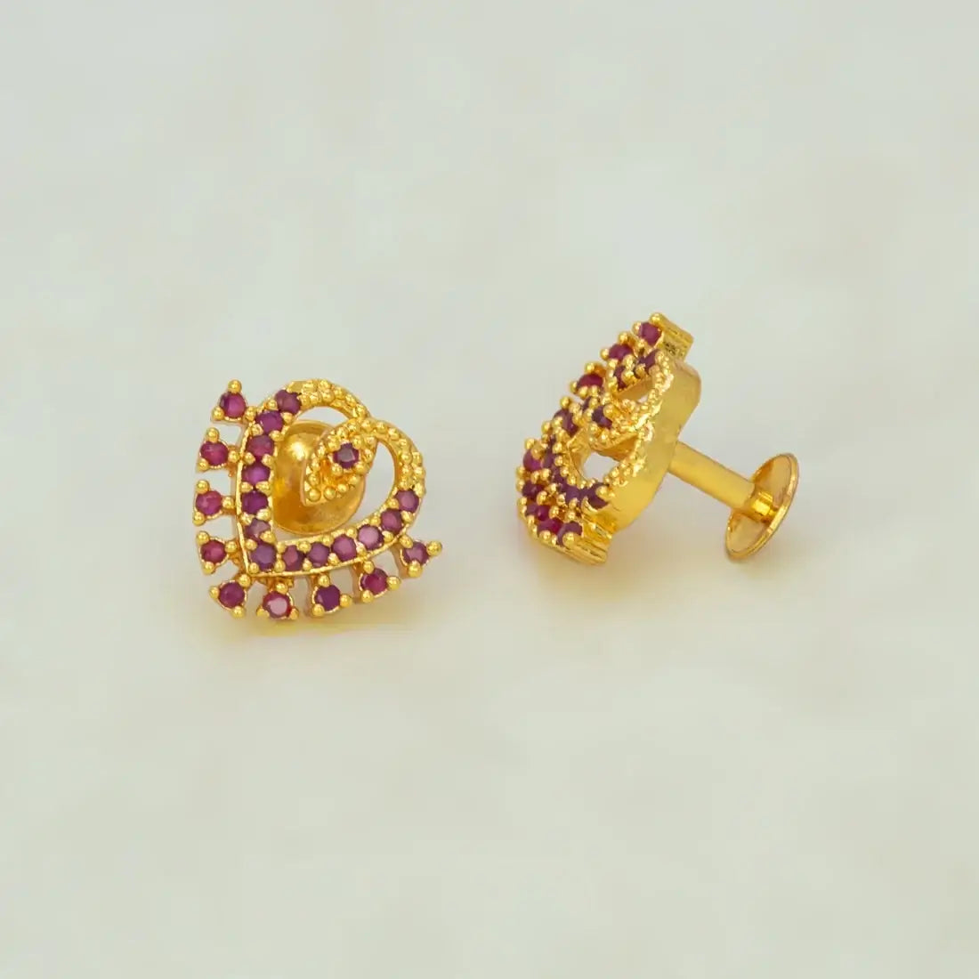Dazzling Gold Plated Stone Heart Stud Earrings with sparkling stones and layered heart design in gold.