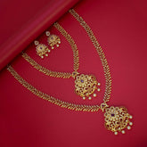 Gorgeous CZ Ruby Floral Wedding Jewellery Set featuring gold-plated necklaces and earrings on a red background.
