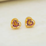 Gold Heart Design Stone Stud Earrings with ruby stones and intricate heart-shaped design.