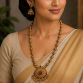 Antique Matte Gold Beads Long Chain Necklace Set worn with ornate jhumka earrings on a model in traditional attire.
