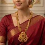 Kemp Stone Antique Long Haram Set for Women worn by model in traditional attire with intricate jewelry details.