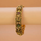 Kemp Stone Floral Lakshmi Antique Kada Bangle with intricate medallion detailing and gemstone accents.
