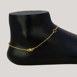 Delicate Gold Plated Star Box Chain Anklets displayed elegantly on a mannequin foot in a black finish.