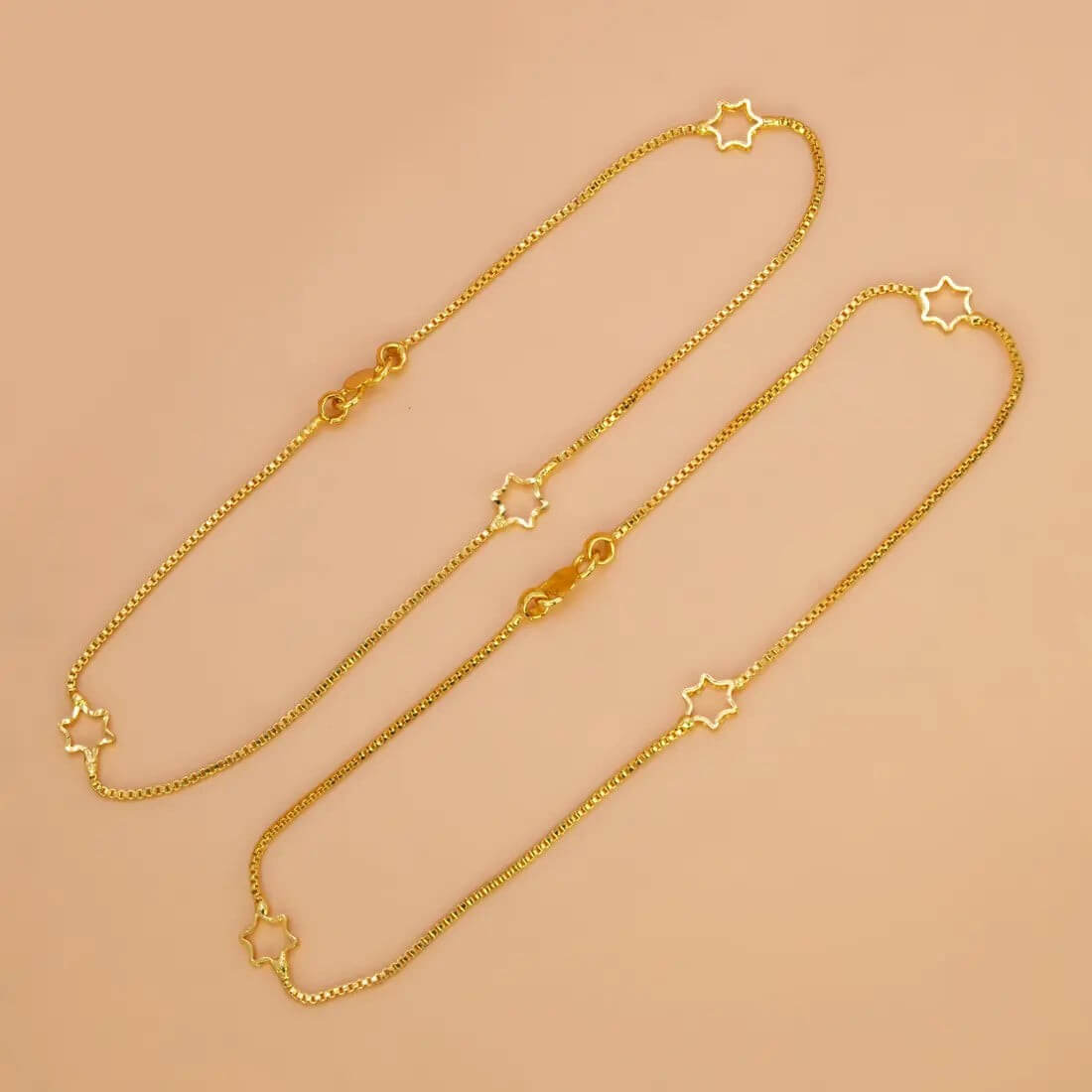 Delicate Gold Plated Star Box Chain Anklets featuring star charms in bright gold finish.