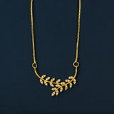 Gold Plated American Diamond Leaf Pendant Necklace showcasing a sparkling leaf branch with cubic zirconia stones.