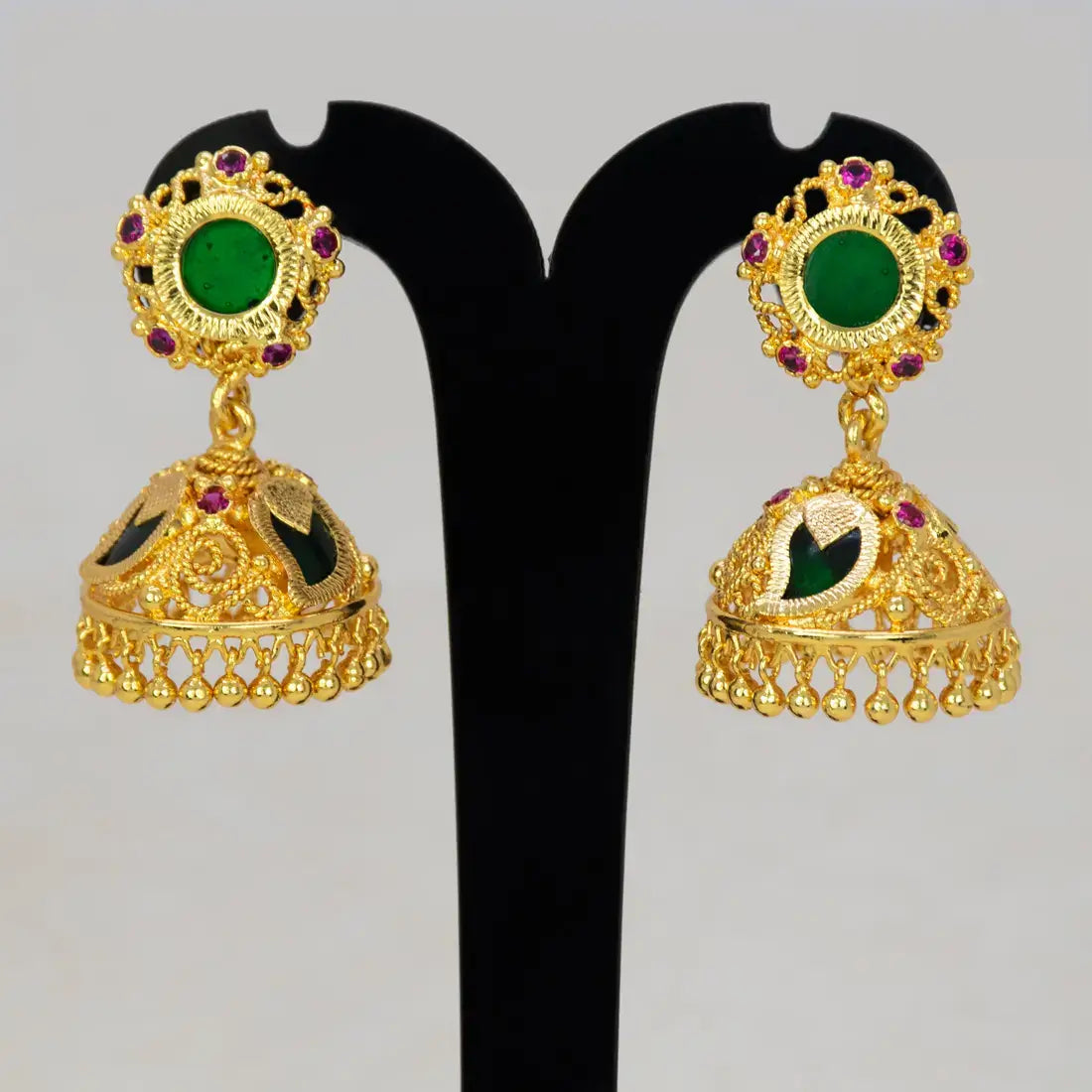 Small Gold-Plated Ruby Stone Mango Jhumka Earrings featuring intricate filigree and green mango motifs.