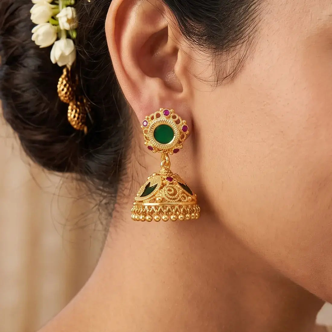 Small Gold-Plated Ruby Stone Mango Jhumka Earrings showcasing intricate design and vibrant colors