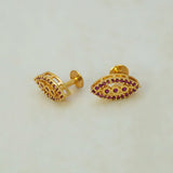 Marquise Ruby Stone Gold-plated Stud Earrings featuring graduated ruby stones and elegant gold-plated design.