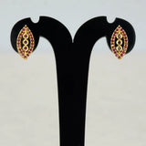 Marquise Ruby Stone Gold-plated Stud Earrings featuring three graduated ruby stones in a classic eye shape.